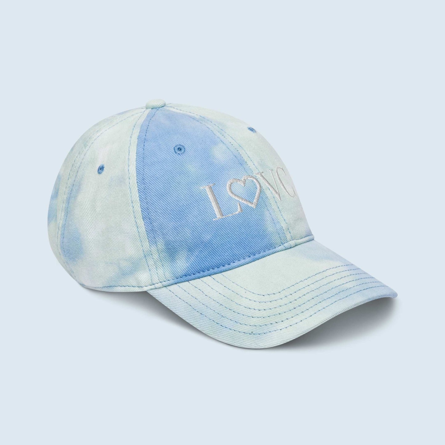 GORRA CON EFECTO TIE DYE HOMBRE LOGO BLANCO