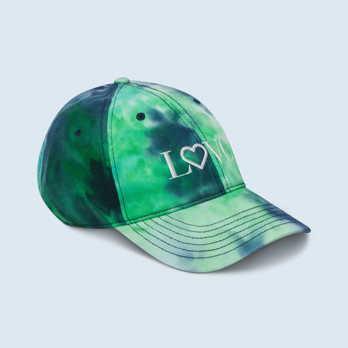 GORRA CON EFECTO TIE DYE HOMBRE LOGO BLANCO